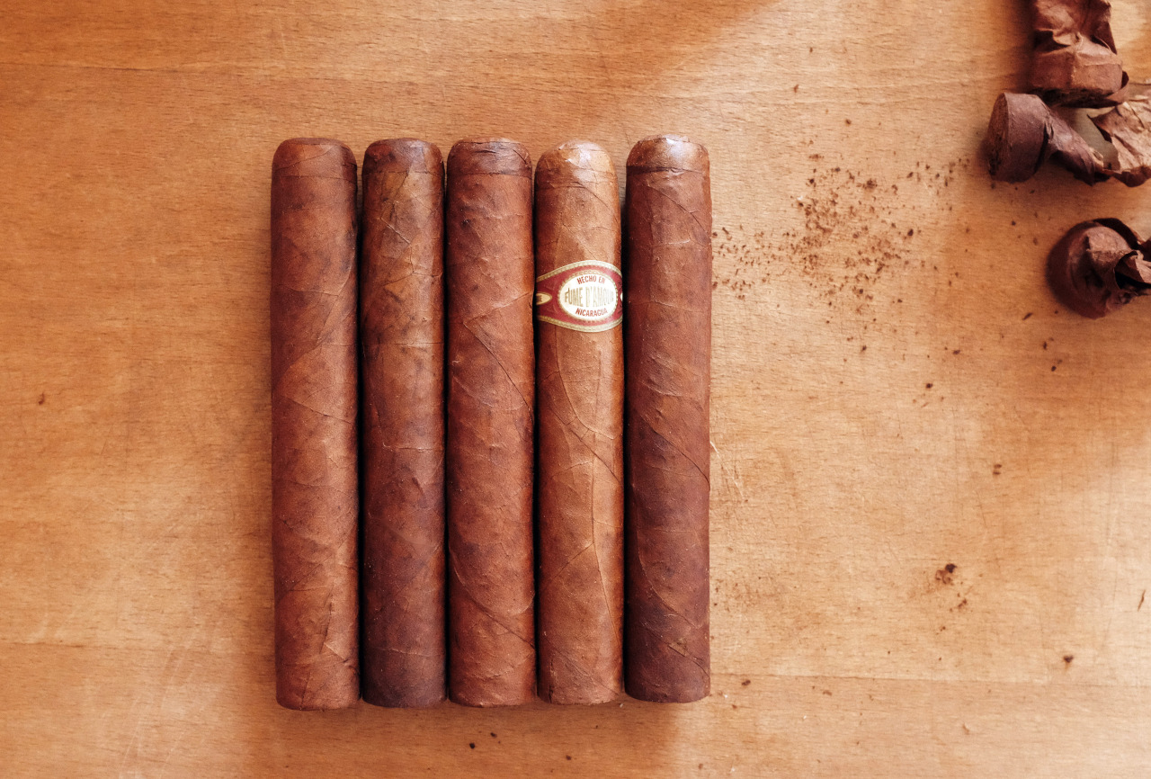 Four fresh Bliss Habano Robustos; one well-aged Illusione Fume d’Amour.