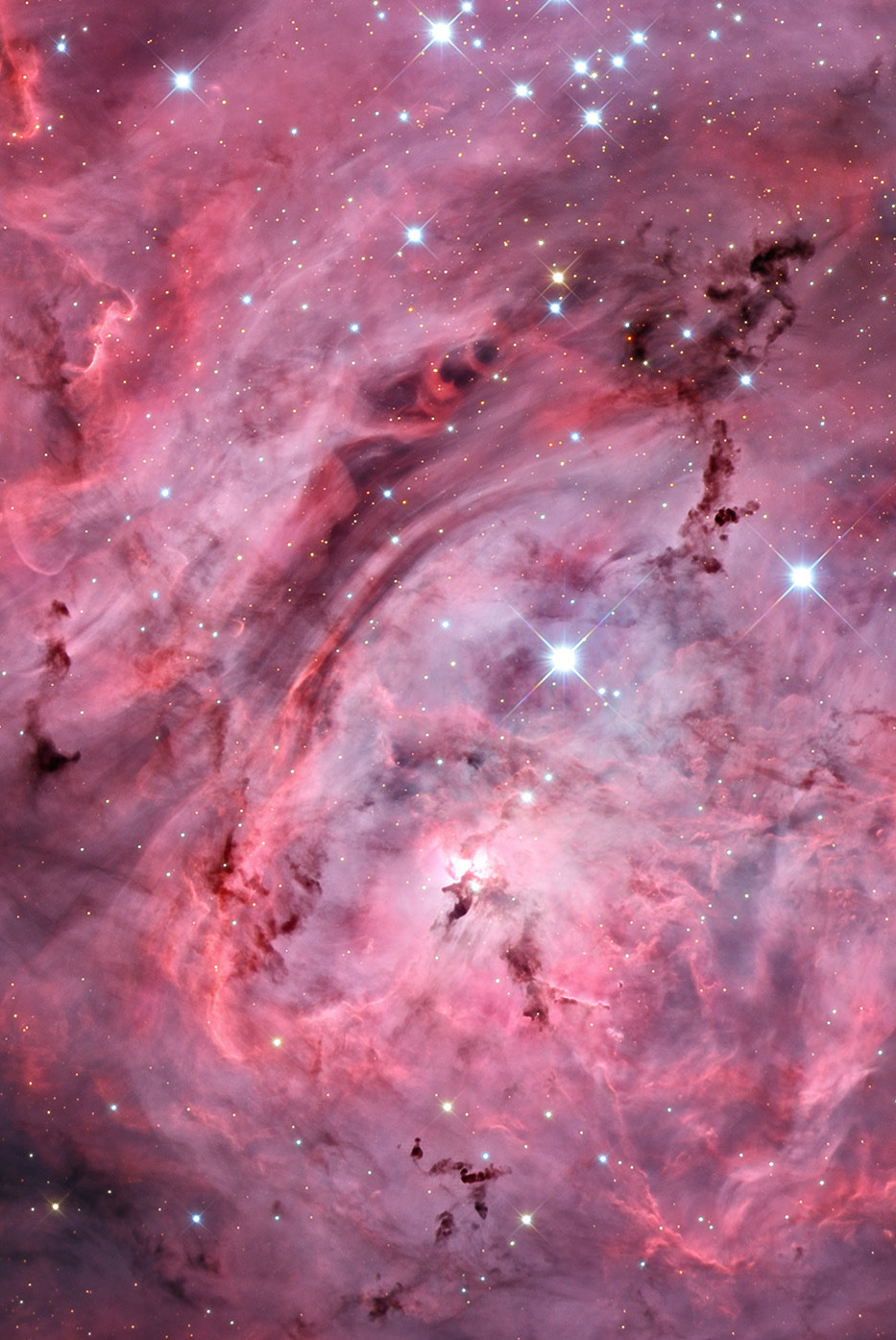astronomicalwonders:<br />“ The Lagoon Nebula - M8  4000 light-years away in the constellation Sagittarius there is a region of space known as the Lagoon Nebula. This giant cloud of gas and dust is creating intensely bright young stars, and is home to...