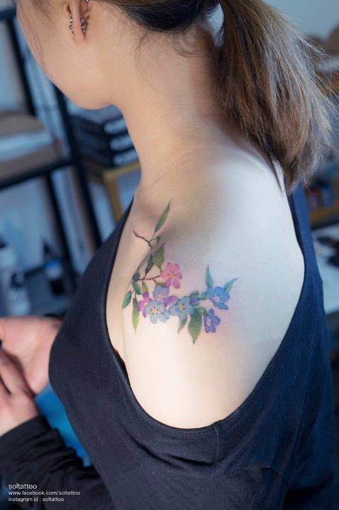 Tattoo tagged with: flower, small, violet, tiny, blue, yellow, pink,  little, nature, shoulder, soltattoo, medium size, green, illustrative,  brown 