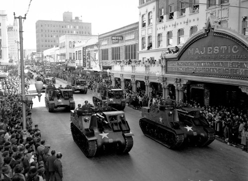 M7 Priest Mobile Artillery rolling down Houston Street in San Antonio on November 11, 1946 Armistice Day