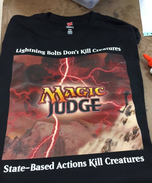 Magic: the Gathering - Funny TeeAwesome hilarious Magic Judge t-shirt, posted by @MaxPlaysMTG
Lightning Bolts Don’t Kill Creatures
State-Based Actions Kill Creatures