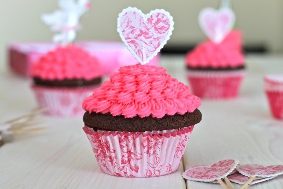 Chocolate Cupcakes With Pink Vanilla Icing.